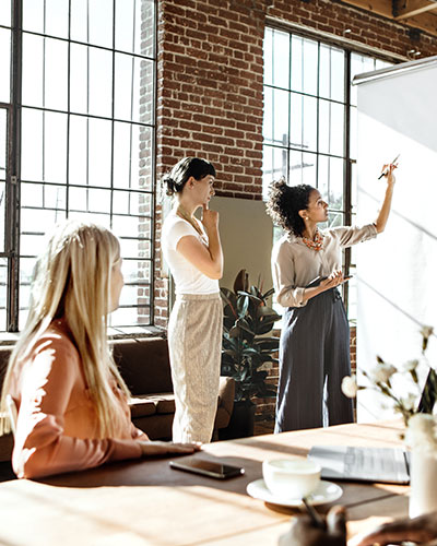 3 female strategic planning consultants